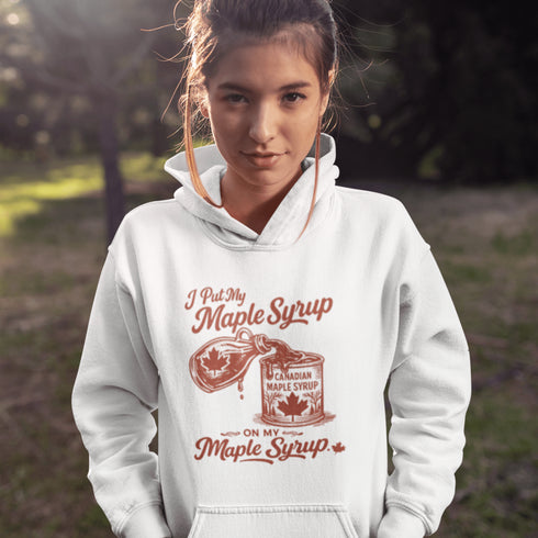 Funny maple syrup hoodie that says “I Put My Maple Syrup On My Maple Syrup” Canadian humor hoodie with vintage maple syrup graphic.