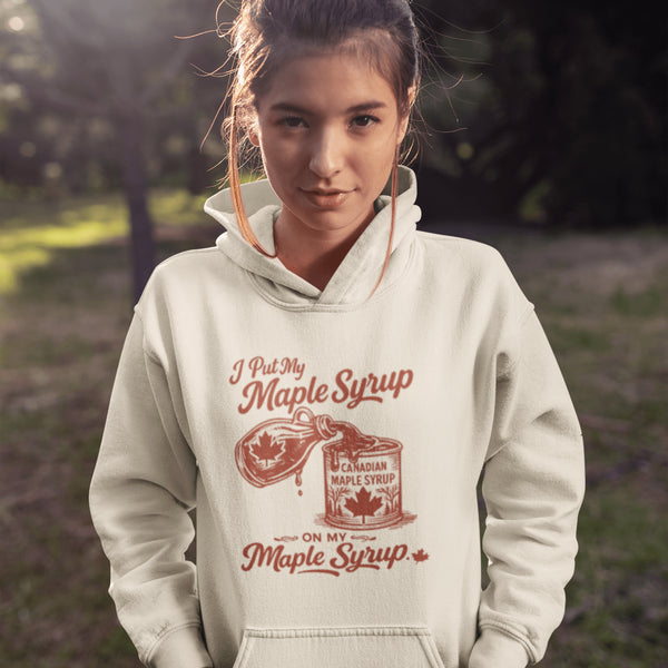 Funny maple syrup hoodie that says “I Put My Maple Syrup On My Maple Syrup” Canadian humor hoodie with vintage maple syrup graphic.