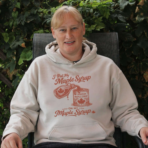 Funny maple syrup hoodie that says “I Put My Maple Syrup On My Maple Syrup” Canadian humor hoodie with vintage maple syrup graphic.