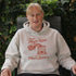 Funny maple syrup hoodie that says “I Put My Maple Syrup On My Maple Syrup” Canadian humor hoodie with vintage maple syrup graphic.