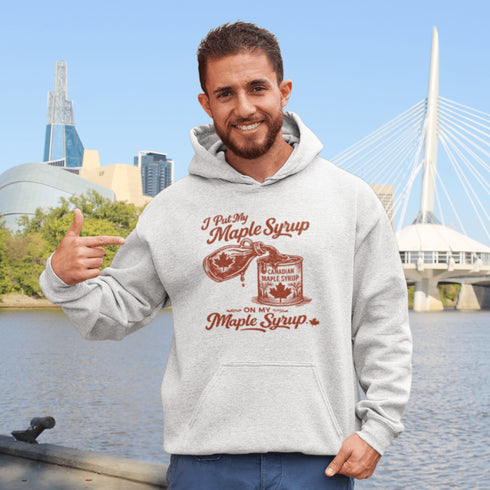 Funny maple syrup hoodie that says “I Put My Maple Syrup On My Maple Syrup” Canadian humor hoodie with vintage maple syrup graphic.