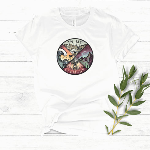 The In My Element t-shirt features a striking circular graphic representing the four classical elements—Fire, Water, Wind, and Earth.