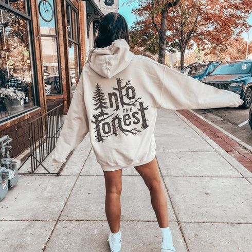 Step into nature with style and comfort with the Into the Forest hoodie, featuring a stunning tree branch font design.