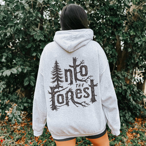 Step into nature with style and comfort with the Into the Forest hoodie, featuring a stunning tree branch font design.