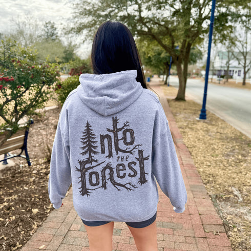 Step into nature with style and comfort with the Into the Forest hoodie, featuring a stunning tree branch font design.