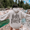 Step into nature with style and comfort with the Into the Forest hoodie, featuring a stunning tree branch font design.