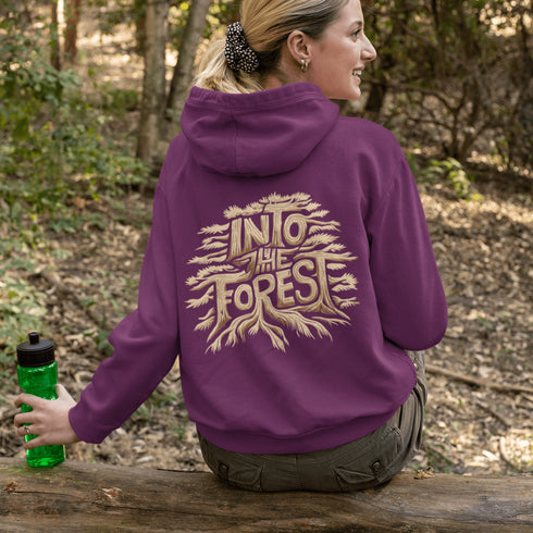 Featuring the phrase "Into the Forest" uniquely crafted in tree branch lettering, this design brings the beauty and mystery of the woods to life.