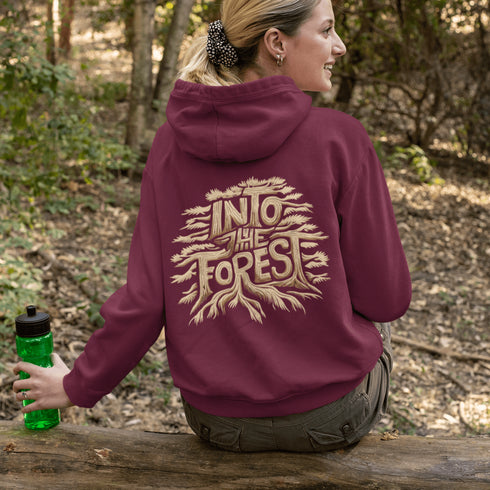 Featuring the phrase "Into the Forest" uniquely crafted in tree branch lettering, this design brings the beauty and mystery of the woods to life.