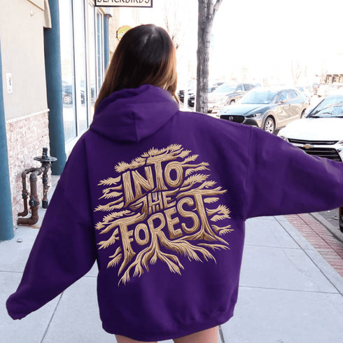 Featuring the phrase "Into the Forest" uniquely crafted in tree branch lettering, this design brings the beauty and mystery of the woods to life.
