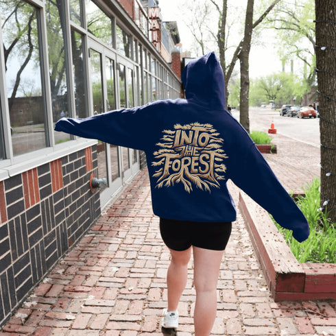 Featuring the phrase "Into the Forest" uniquely crafted in tree branch lettering, this design brings the beauty and mystery of the woods to life.