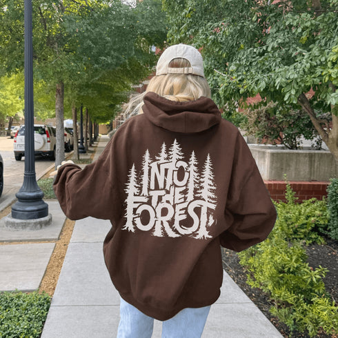 Step into the wild with the Into The Forest hoodie, where style meets nature in the most unforgettable way.