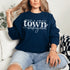 Small Town Hockey Mom sweatshirt with white typography design on a cozy white crewneck, perfect for rink moms and hockey season apparel