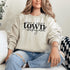 Small Town Hockey Mom sweatshirt with black typography design on a cozy white crewneck, perfect for rink moms and hockey season apparel