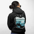 This hoodie features a silhouetted polar bear wandering across layered frozen prairie hills, this design captures the quiet majesty of nature.