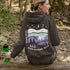 Featuring a sleek polar bear silhouette wandering through layered frozen prairie hills, this hoodie design evokes the serenity of untouched nature.