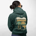 Celebrate the beauty of the prairies with this bold color-blocked hoodie featuring a striking bison silhouette, golden wheat fields, and an open prairie sky.