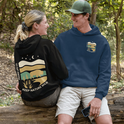 Celebrate the beauty of the prairies with this bold color-blocked hoodie featuring a striking bison silhouette, golden wheat fields, and an open prairie sky.