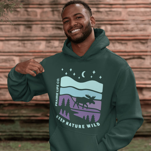 Featuring a minimalist moose design inspired by Canada’s untamed landscapes, this hoodie captures the simple joy of being present in nature.