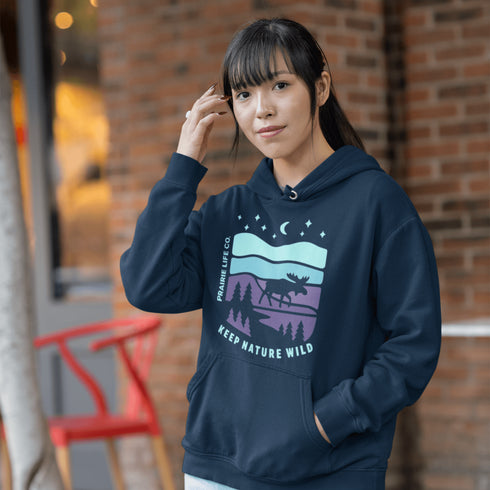 Featuring a minimalist moose design inspired by Canada’s untamed landscapes, this hoodie captures the simple joy of being present in nature.