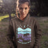 Featuring a minimalist moose design inspired by Canada’s untamed landscapes, this hoodie captures the simple joy of being present in nature.