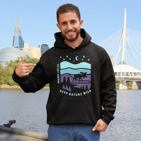 Featuring a minimalist moose design inspired by Canada’s untamed landscapes, this hoodie captures the simple joy of being present in nature.