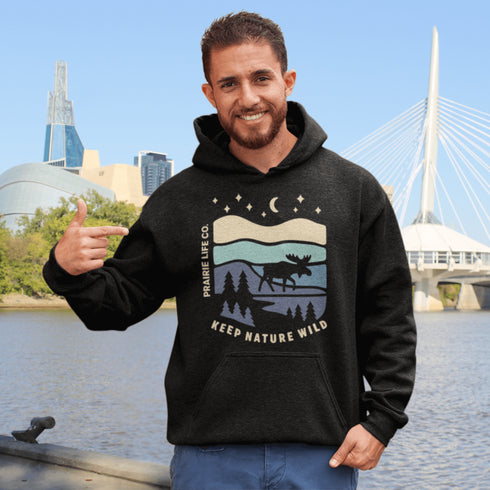 Featuring a moose design paired with a nature-inspired landscape, this hoodie reflects the beauty of Canada’s wild spaces and the importance of protecting them.