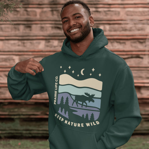 Featuring a moose design paired with a nature-inspired landscape, this hoodie reflects the beauty of Canada’s wild spaces and the importance of protecting them.