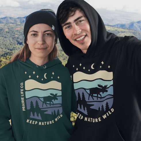 Featuring a moose design paired with a nature-inspired landscape, this hoodie reflects the beauty of Canada’s wild spaces and the importance of protecting them.