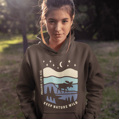 Featuring a moose design paired with a nature-inspired landscape, this hoodie reflects the beauty of Canada’s wild spaces and the importance of protecting them.