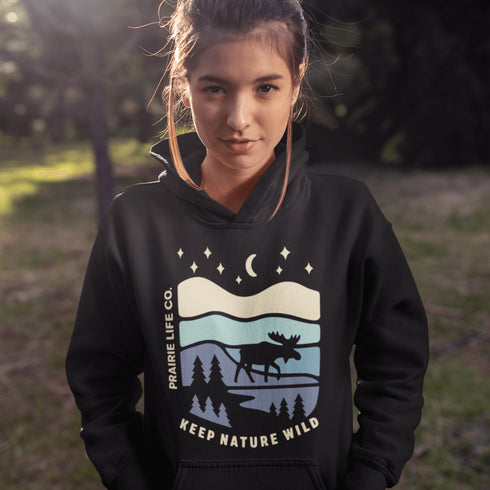Featuring a moose design paired with a nature-inspired landscape, this hoodie reflects the beauty of Canada’s wild spaces and the importance of protecting them.