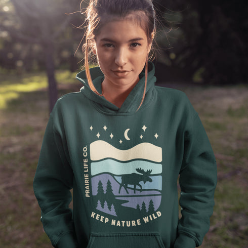 Featuring a moose design paired with a nature-inspired landscape, this hoodie reflects the beauty of Canada’s wild spaces and the importance of protecting them.