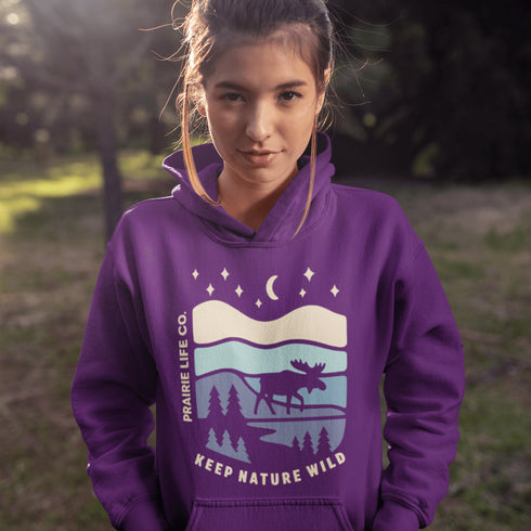 Featuring a moose design paired with a nature-inspired landscape, this hoodie reflects the beauty of Canada’s wild spaces and the importance of protecting them.