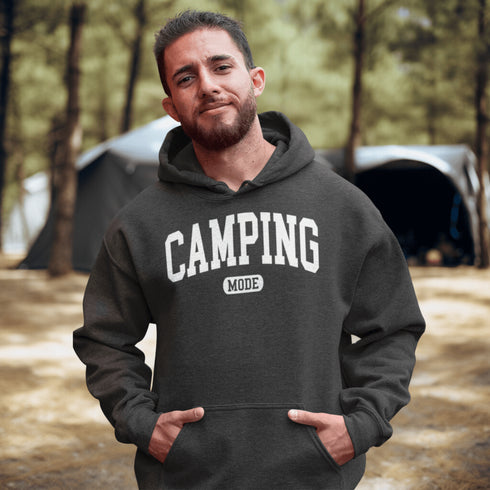 Introducing the ultimate must-have for every outdoor enthusiast who secretly wishes they could bring a slice of home comfort to the wilderness: the "Camping Mode" Hoodie.