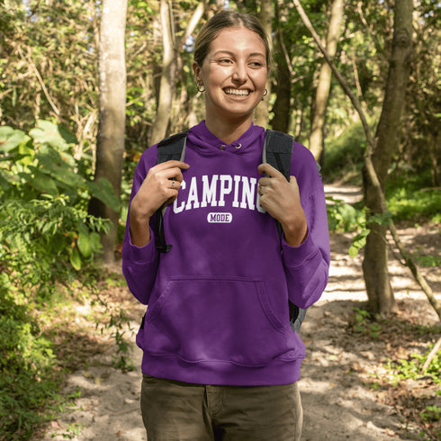 Introducing the ultimate must-have for every outdoor enthusiast who secretly wishes they could bring a slice of home comfort to the wilderness: the "Camping Mode" Hoodie.