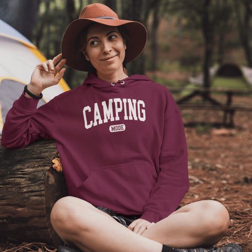 Introducing the ultimate must-have for every outdoor enthusiast who secretly wishes they could bring a slice of home comfort to the wilderness: the "Camping Mode" Hoodie.