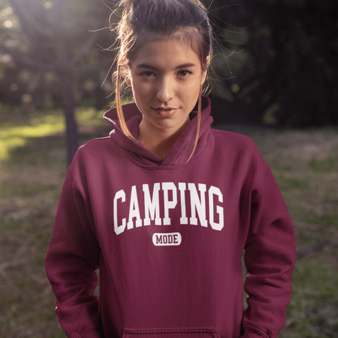 Introducing the ultimate must-have for every outdoor enthusiast who secretly wishes they could bring a slice of home comfort to the wilderness: the "Camping Mode" Hoodie.