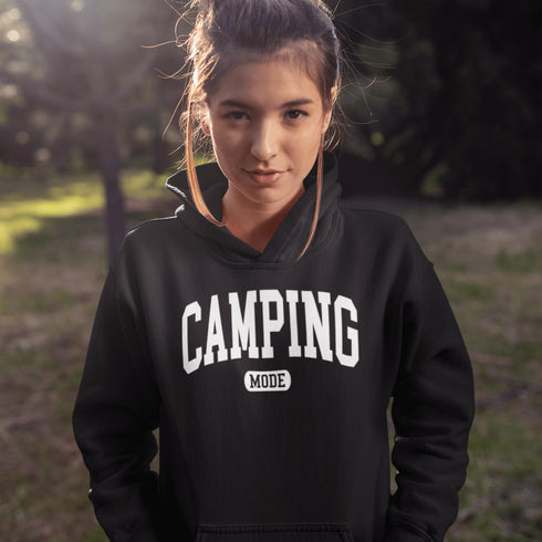 Introducing the ultimate must-have for every outdoor enthusiast who secretly wishes they could bring a slice of home comfort to the wilderness: the "Camping Mode" Hoodie.