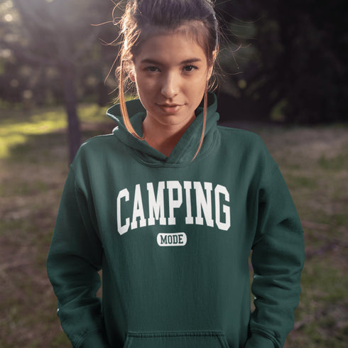Introducing the ultimate must-have for every outdoor enthusiast who secretly wishes they could bring a slice of home comfort to the wilderness: the "Camping Mode" Hoodie.