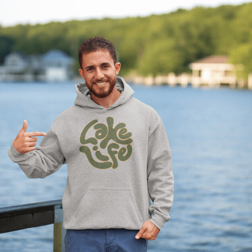 Embrace the serene vibe of lakeside living with our "Lake Life" Hoodie, a perfect blend of comfort and nostalgia. Crafted with a nod to the laid-back, timeless appeal of lake life, this hoodie features the phrase "Lake Life" prominently displayed in a charming retro font that evokes memories of sunny days spent by the water, laughter-filled evenings around campfires, and the soothing tranquility of nature.