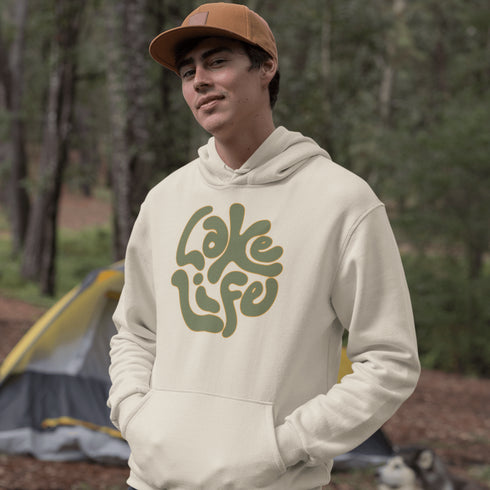 Embrace the serene vibe of lakeside living with our "Lake Life" Hoodie, a perfect blend of comfort and nostalgia. Crafted with a nod to the laid-back, timeless appeal of lake life, this hoodie features the phrase "Lake Life" prominently displayed in a charming retro font that evokes memories of sunny days spent by the water, laughter-filled evenings around campfires, and the soothing tranquility of nature.