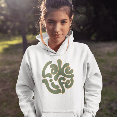 Embrace the serene vibe of lakeside living with our "Lake Life" Hoodie, a perfect blend of comfort and nostalgia. Crafted with a nod to the laid-back, timeless appeal of lake life, this hoodie features the phrase "Lake Life" prominently displayed in a charming retro font that evokes memories of sunny days spent by the water, laughter-filled evenings around campfires, and the soothing tranquility of nature.