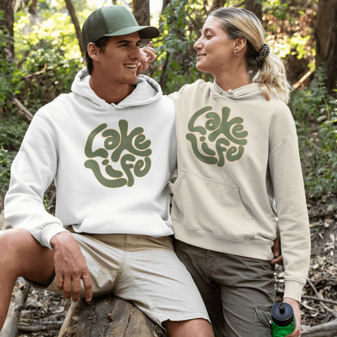 Embrace the serene vibe of lakeside living with our "Lake Life" Hoodie, a perfect blend of comfort and nostalgia. Crafted with a nod to the laid-back, timeless appeal of lake life, this hoodie features the phrase "Lake Life" prominently displayed in a charming retro font that evokes memories of sunny days spent by the water, laughter-filled evenings around campfires, and the soothing tranquility of nature.