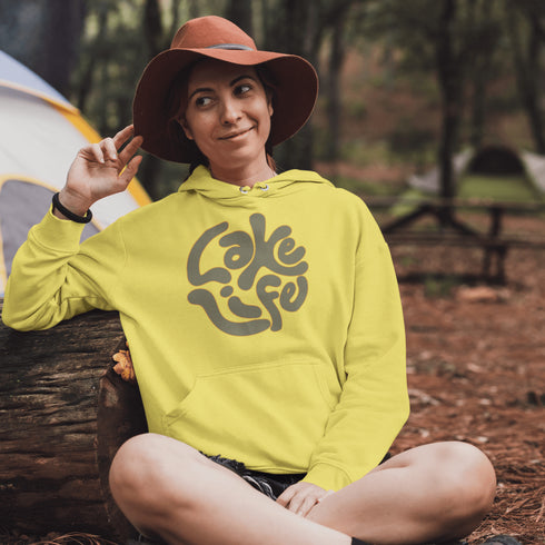 Embrace the serene vibe of lakeside living with our "Lake Life" Hoodie, a perfect blend of comfort and nostalgia. Crafted with a nod to the laid-back, timeless appeal of lake life, this hoodie features the phrase "Lake Life" prominently displayed in a charming retro font that evokes memories of sunny days spent by the water, laughter-filled evenings around campfires, and the soothing tranquility of nature.