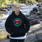 Ever wish you could bottle up the magic of a Whiteshell sunset without the threat of a mosquito swarm? Now you can! With this cozy hoodie featuring a stunning lake view from the heart of Manitoba’s Whiteshell, you’ll be wrapped in nature’s beauty while staying warm and bug-free.