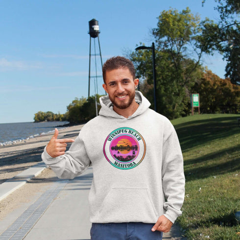 Featuring a dreamy sunset scene with the iconic Winnipeg Beach water tower standing tall, this hoodie gives you all the feels of a perfect beach day without the sand in your shoes.