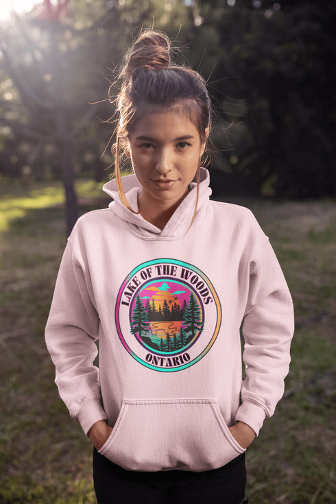 Featuring a stunning lake scene with a vibrant sunset, this hoodie captures the beauty of Lake of the Woods in Ontario, where tranquil waters meet the warm glow of a setting sun.