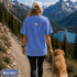 Comfort Colors 1717 unisex t-shirt featuring a coordinating left chest pocket design and large outdoor-inspired back graphic, shown in a lifestyle setting and available in multiple garment-dyed colours.