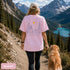 Comfort Colors 1717 unisex t-shirt featuring a coordinating left chest pocket design and large outdoor-inspired back graphic, shown in a lifestyle setting and available in multiple garment-dyed colours.