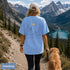 Comfort Colors 1717 unisex t-shirt featuring a coordinating left chest pocket design and large outdoor-inspired back graphic, shown in a lifestyle setting and available in multiple garment-dyed colours.