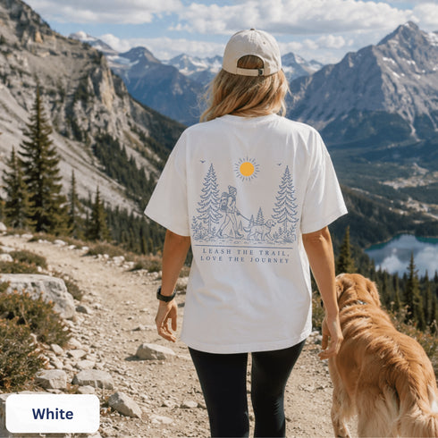 Comfort Colors 1717 unisex t-shirt featuring a coordinating left chest pocket design and large outdoor-inspired back graphic, shown in a lifestyle setting and available in multiple garment-dyed colours.